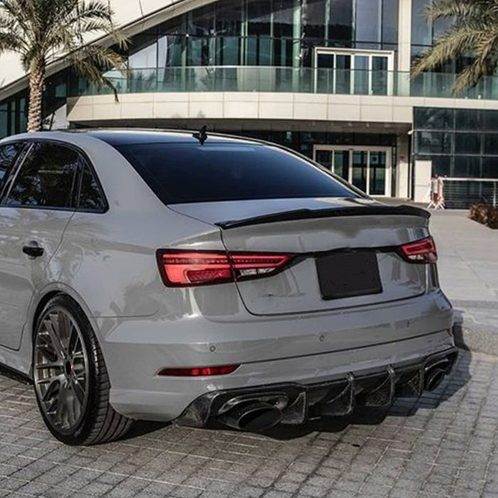 White Audi A3 8Y Sedan with glossy black rear spoiler and diffuser styling
