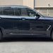 Black BMW X3 G01 2021-2024 with installed side skirts exterior view