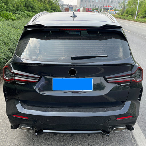 Black roof spoiler for BMW X3 G01 2021-2024 sedan, installed on rear window edge