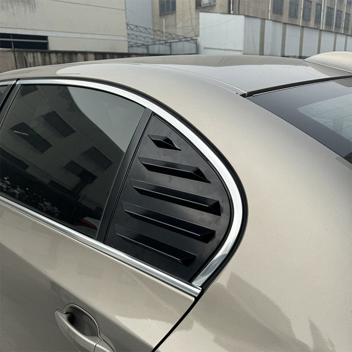 Gloss black louvered bagrude trunk louver installed on white BMW 5-Series E60