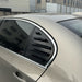 Gloss black louvered bagrude trunk louver installed on white BMW 5-Series E60