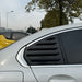 Bagrude black lameller cover with horizontal slats installed on white BMW G20 rear side window