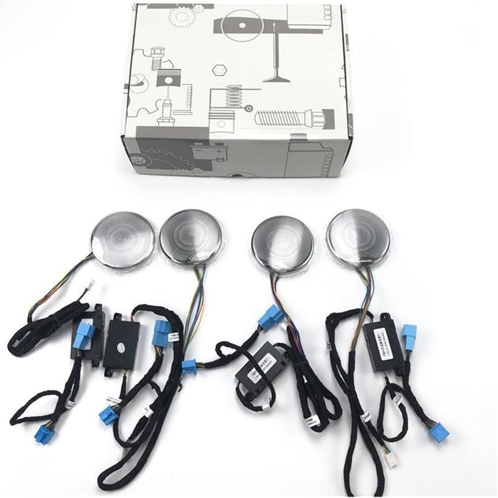 Speaker covers with 64-color ambient lighting kit for Mercedes E-Class W213, includes silver covers and installation cables