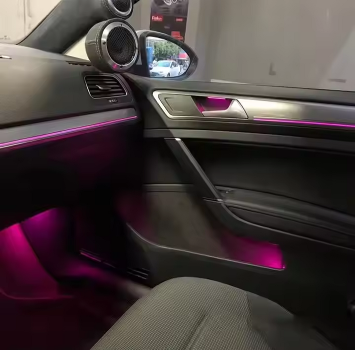 Volkswagen Golf 7 & 7.5 Ambient Lys Pakke with pink LED lighting strips on door panels and dashboard