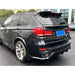 Black diffuser and bagsplitter for BMW X5 F15 M-Pakke installed on vehicle rear bumper