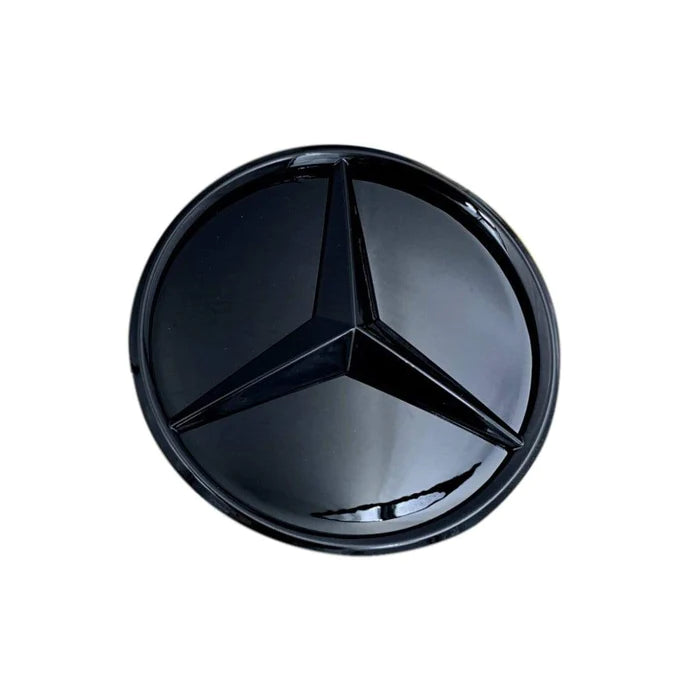 Mercedes logotyp framtill svart